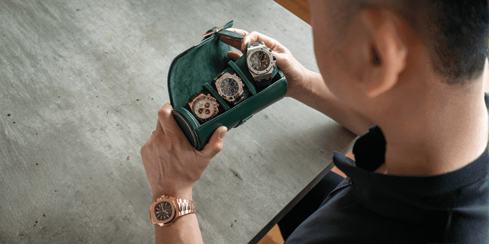 Oliver Roldan showcasing luxury timepieces, reflecting his passion for meaningful achievements and resilience.