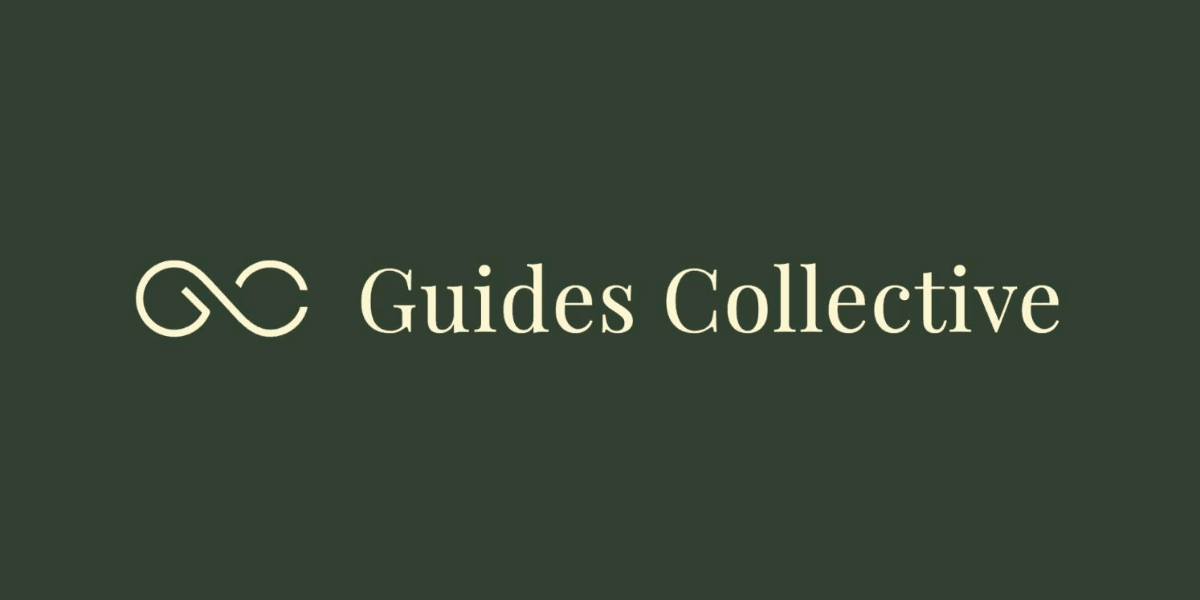 Logo of Guides Collective with intertwined infinity symbol and elegant typography