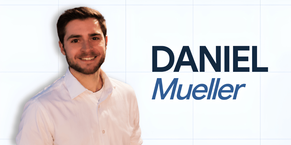 A young man in a white shirt smiles against a light background and name graphic
