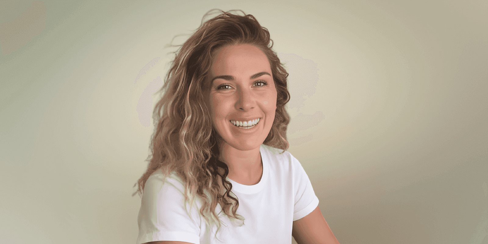 A smiling woman with long curly hair, representing determination and success in building her own AI-powered marketing solution.