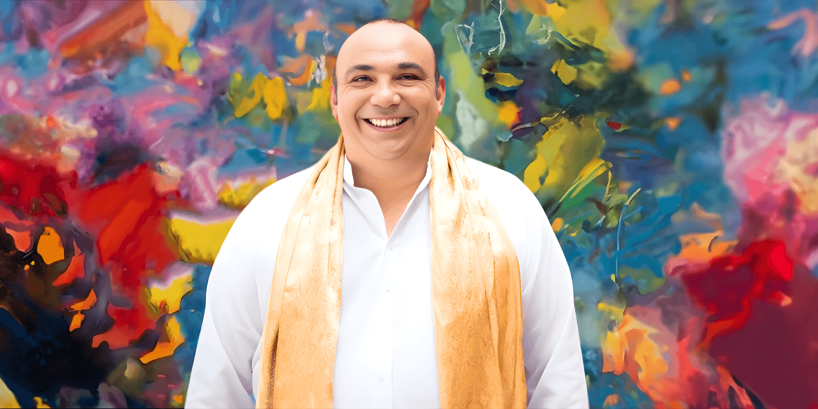 The image shows Eddie Mosler, an artist blending color, energy, and spirituality, promoting his groundbreaking "Cosmic Expansion of the Auric Frequency" exhibition in Madrid.
