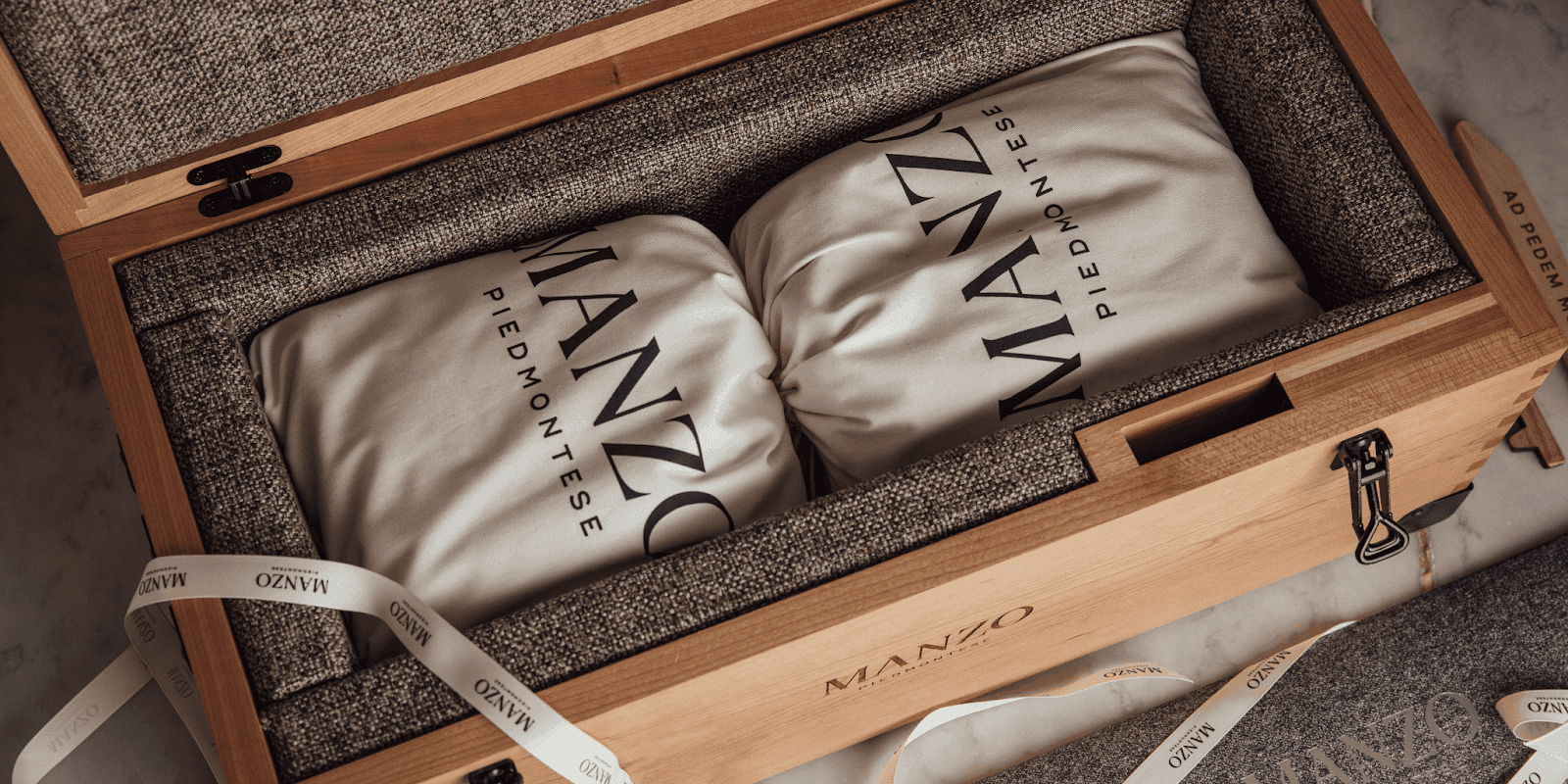 "Manzo premium Fassona beef packaging showcasing the brand’s luxury, precision-crafted beef with minimalist design and emphasis on quality."