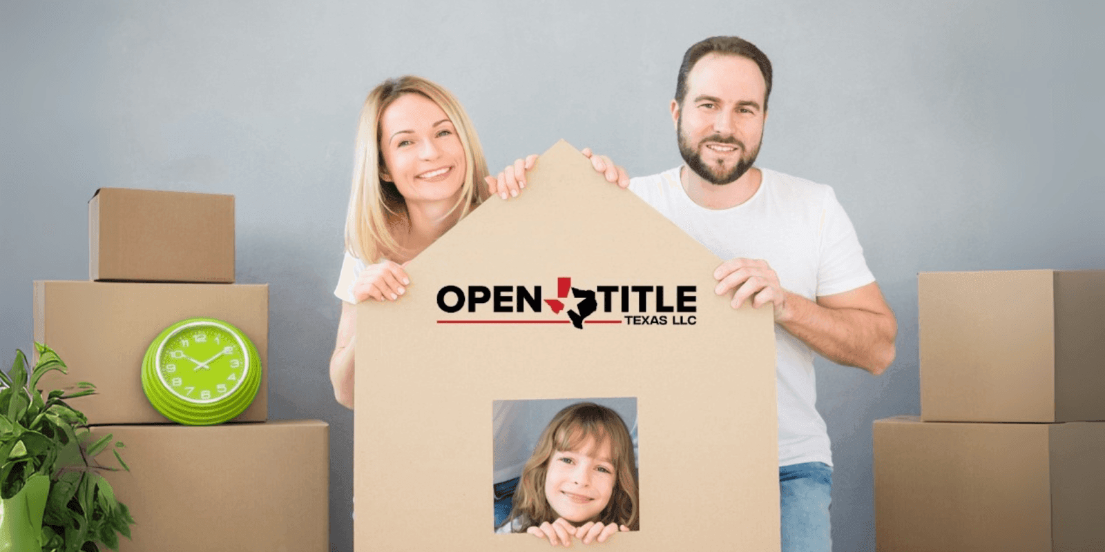 Smiling family with moving boxes holding a house-shaped sign featuring Open Title of Texas LLC logo.