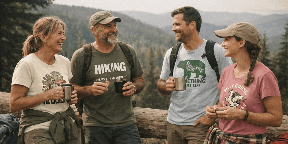Four hikers chatting and drinking coffee at a scenic mountain overlook.
