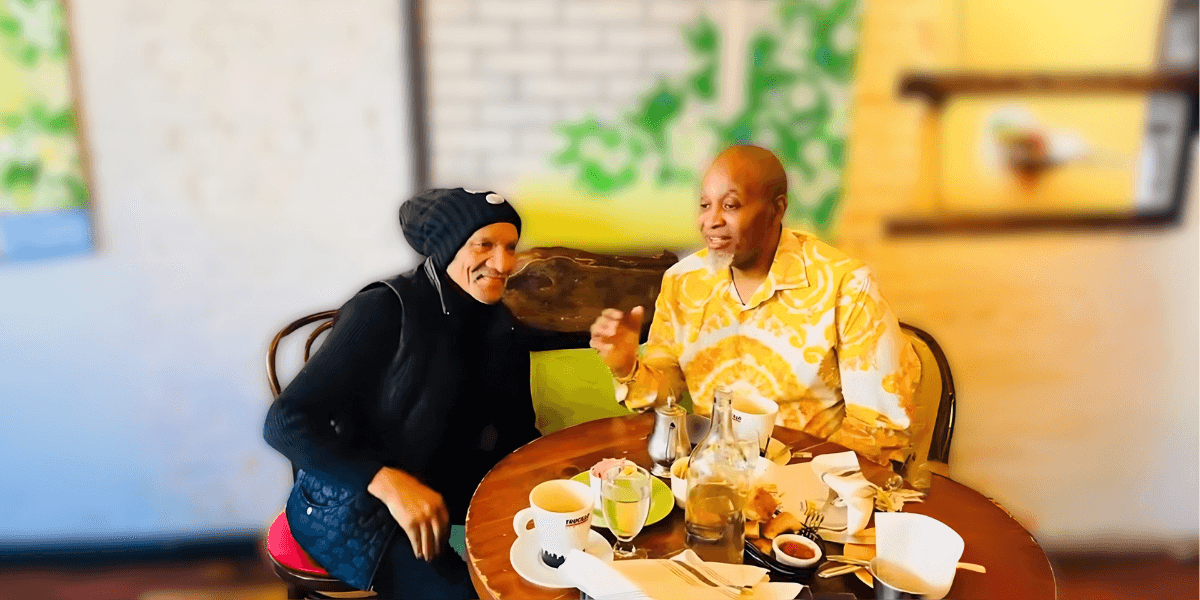 Ralph Carter and Chad Lawson Cooper share a meal while discussing *Justice on Trial Reloaded* stage production.