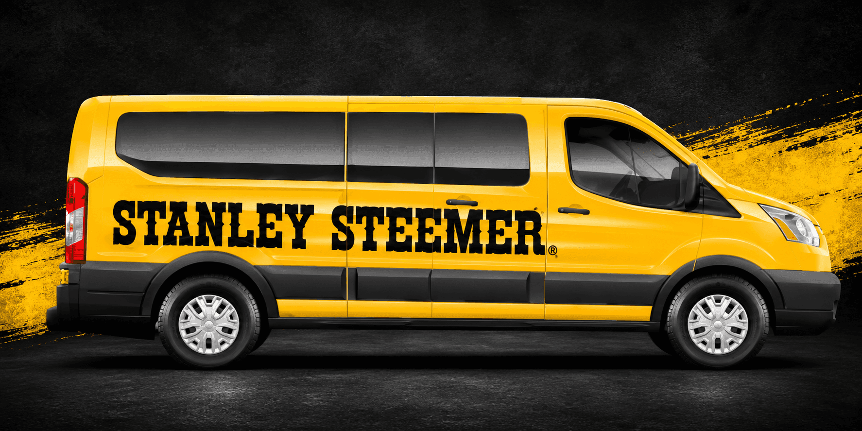 Stanley Steemer service van with company branding on a black and yellow background.