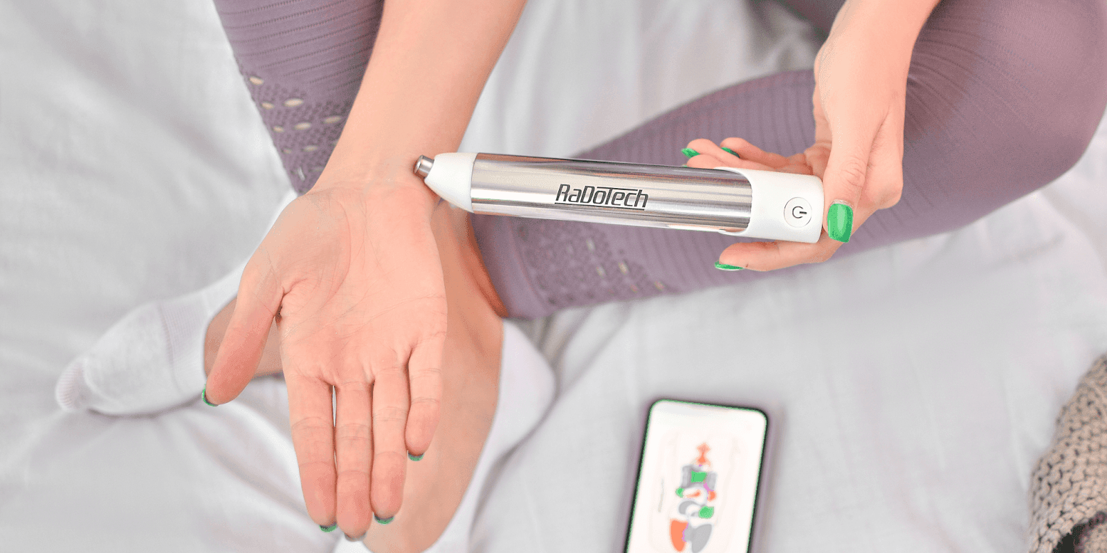 A person using a RaDoTech device to monitor organ health, showcasing innovative technology for proactive, non-invasive health tracking.