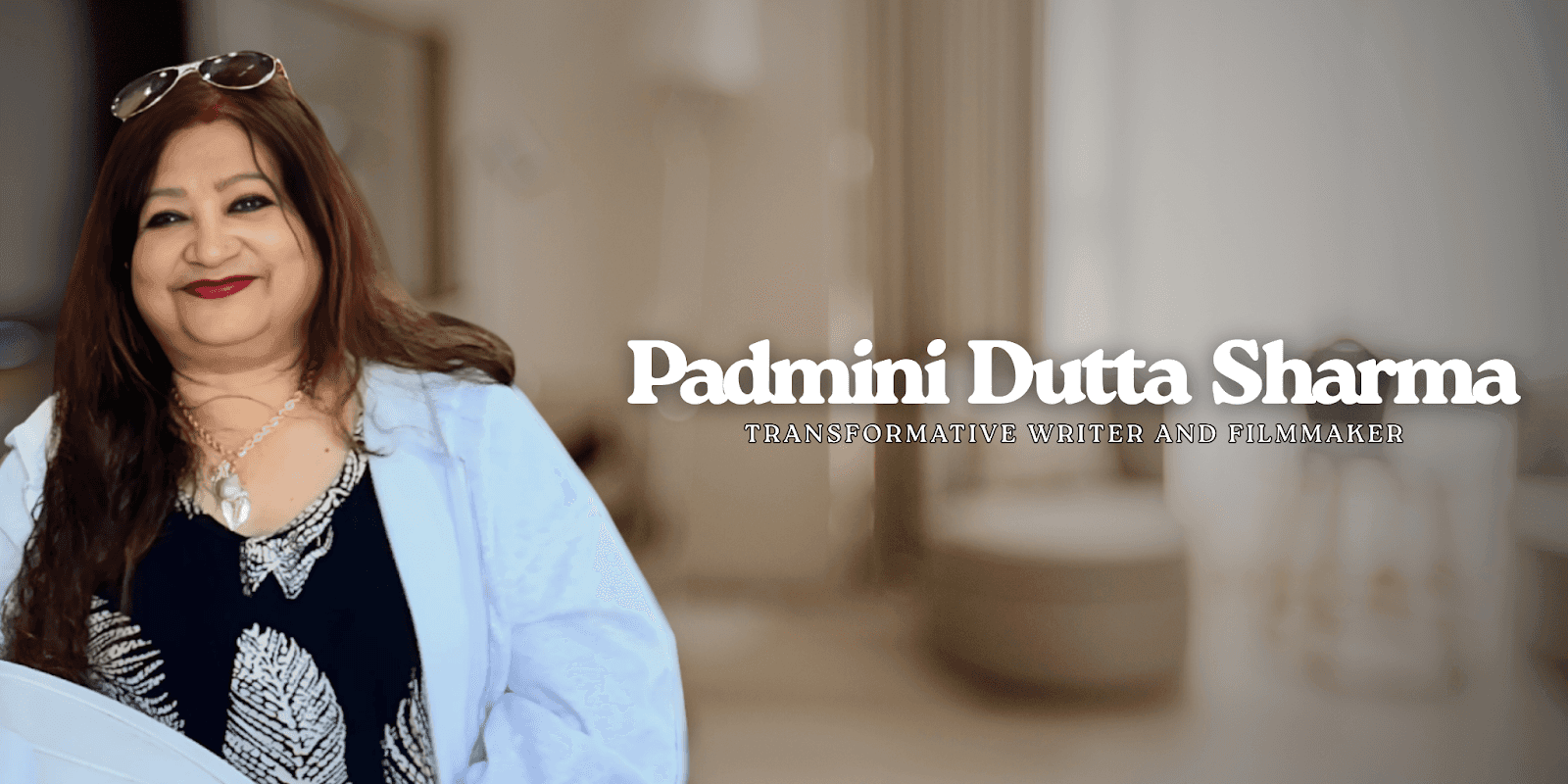 Padmini Dutta Sharma, smiling, with text overlay: "Transformative Writer and Filmmaker" on blurred indoor background.