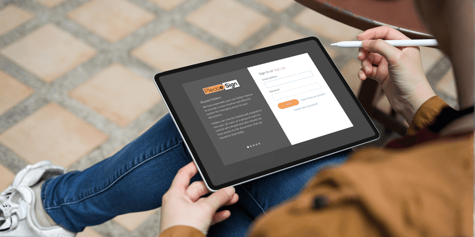 A person using PleaseSign's e-signature platform on a tablet with a stylus.