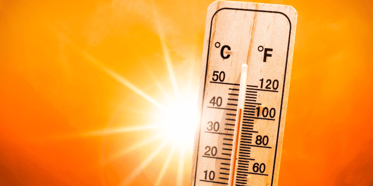 Thermometer showing high temperature, highlighting strain on AC systems in Pembroke Pines during summer heat.
