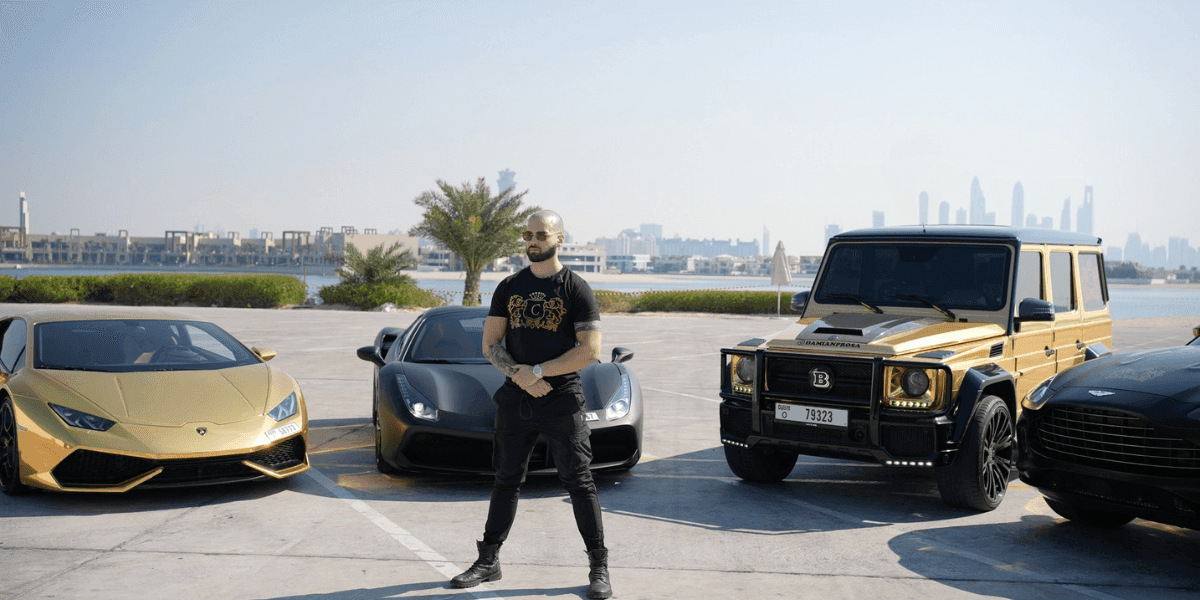 "Damianos Prosalentis, founder of Conclavio, stands confidently beside luxury cars, representing entrepreneurial success and digital business empowerment."