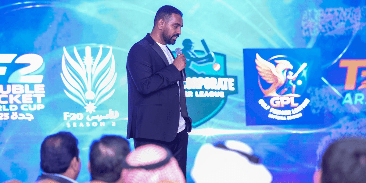 Waqqas Alvi speaks at a cricket event launch showcasing Infinix Holding's sports ventures and global cricket ecosystem.