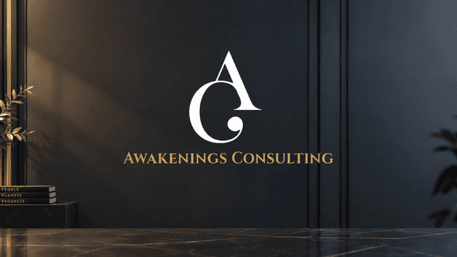 Modern office interior featuring Awakenings Consulting logo on a dark wall