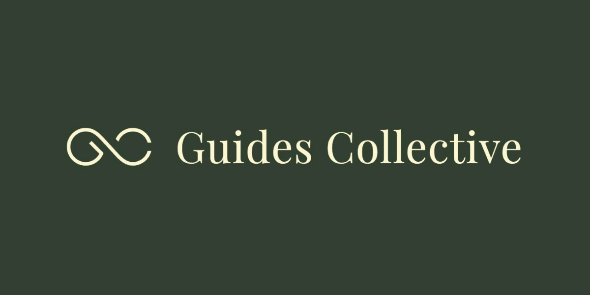 Logo of Guides Collective with intertwined infinity symbol and elegant typography