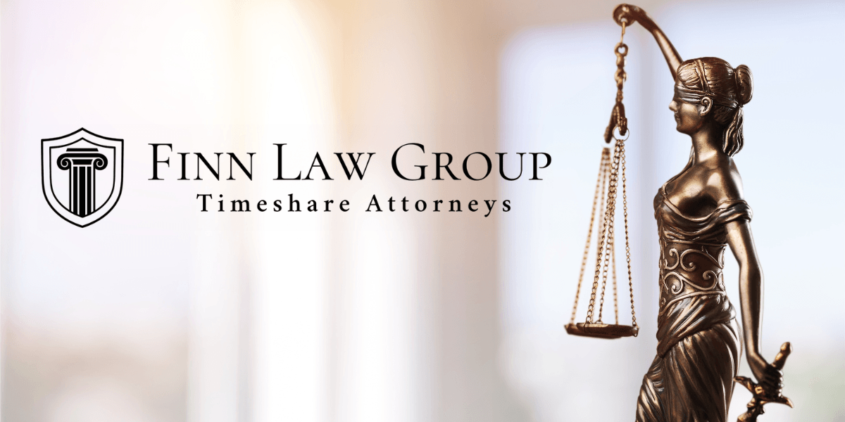 Logo of Finn Law Group with a bronze statue of Lady Justice holding scales