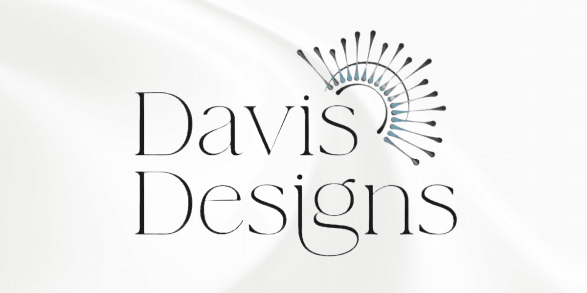 Logo for Davis Designs featuring elegant typography and artistic circular elements