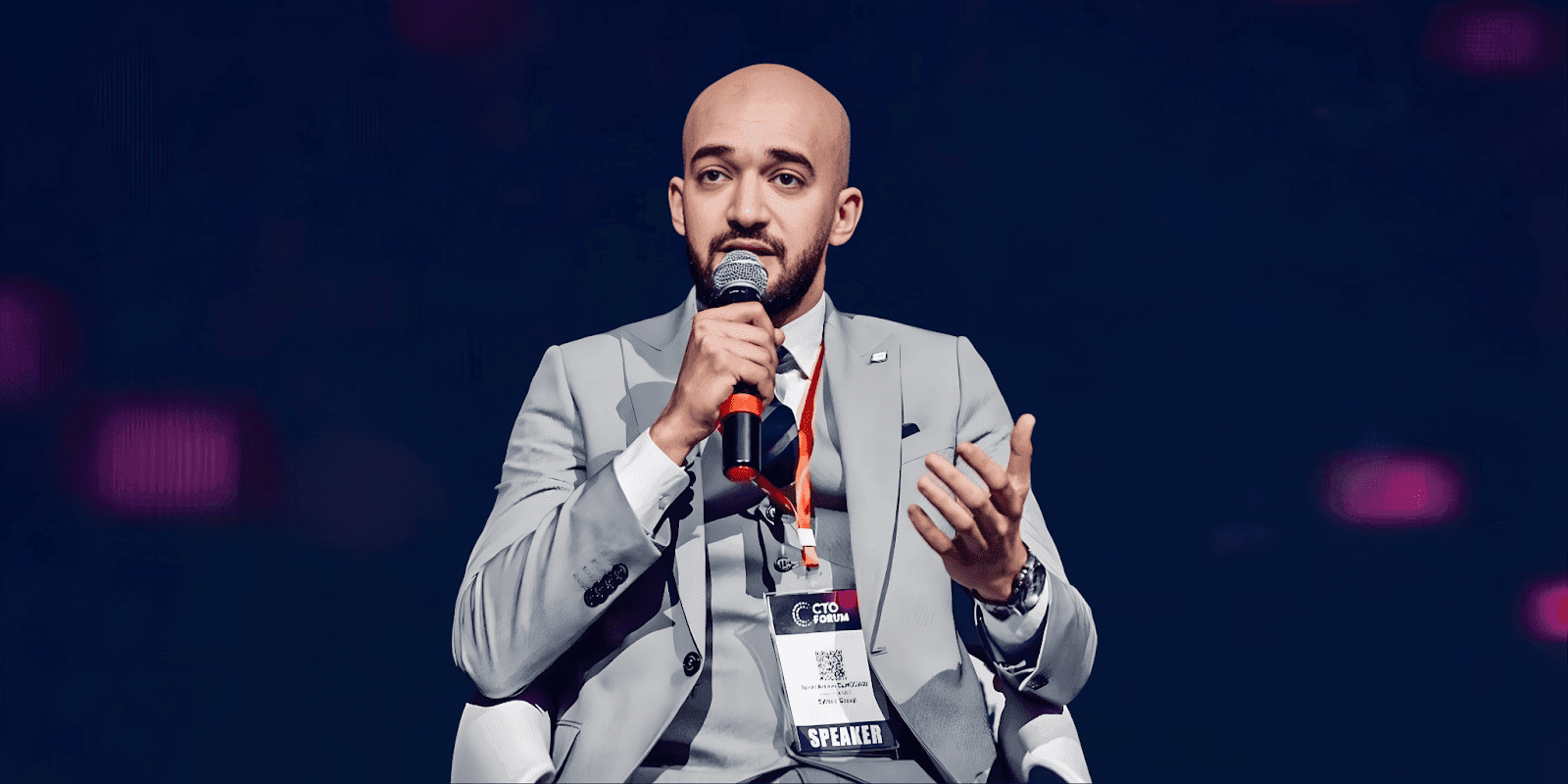 Taher Amine ELHOUARI speaking at a cybersecurity event, emphasizing leadership, operational resilience, and the real-world impact of cybersecurity.