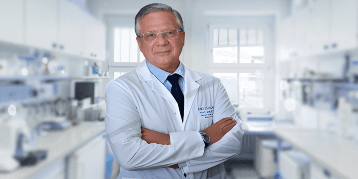 Dr. Subodh Nanavati, a leading Oral and Maxillofacial Surgeon, stands in a clinic, showcasing his expertise in oral health and cancer research.