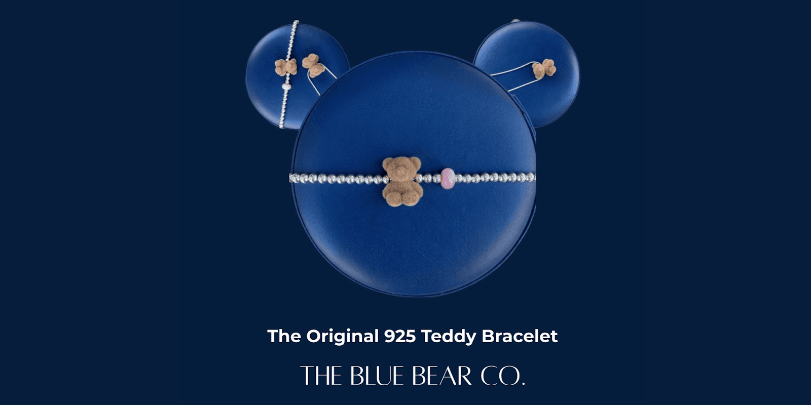 The image showcases The Blue Bear Co.'s teddy-inspired bracelet, a timeless, emotional jewelry piece symbolizing comfort and courage.