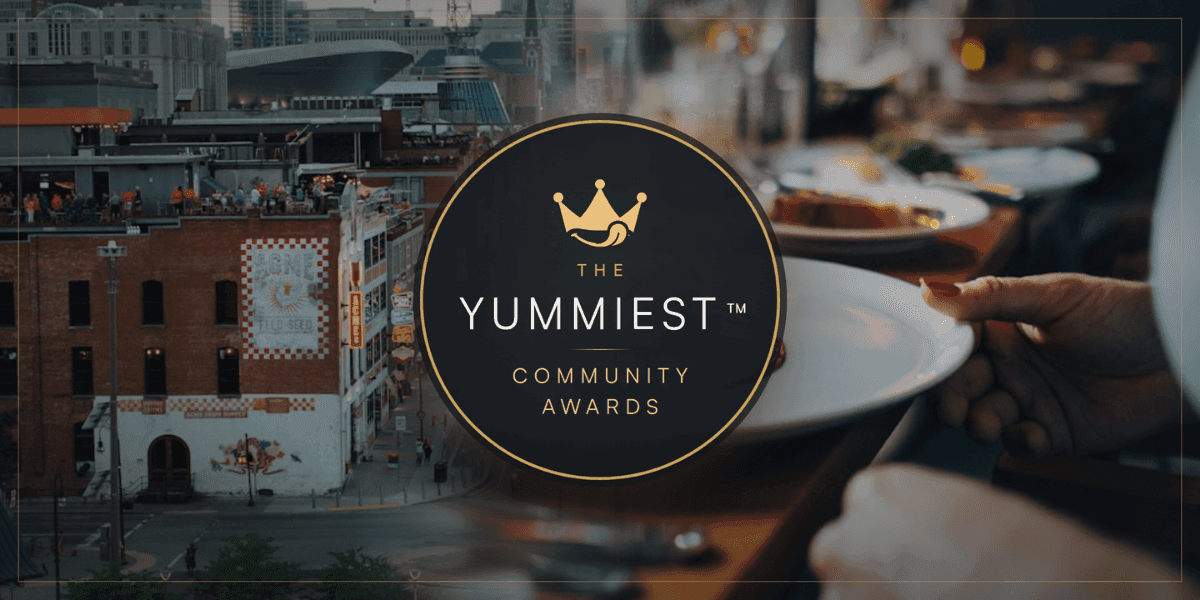 The Yummiest Community Awards logo over restaurant and dining scenes.