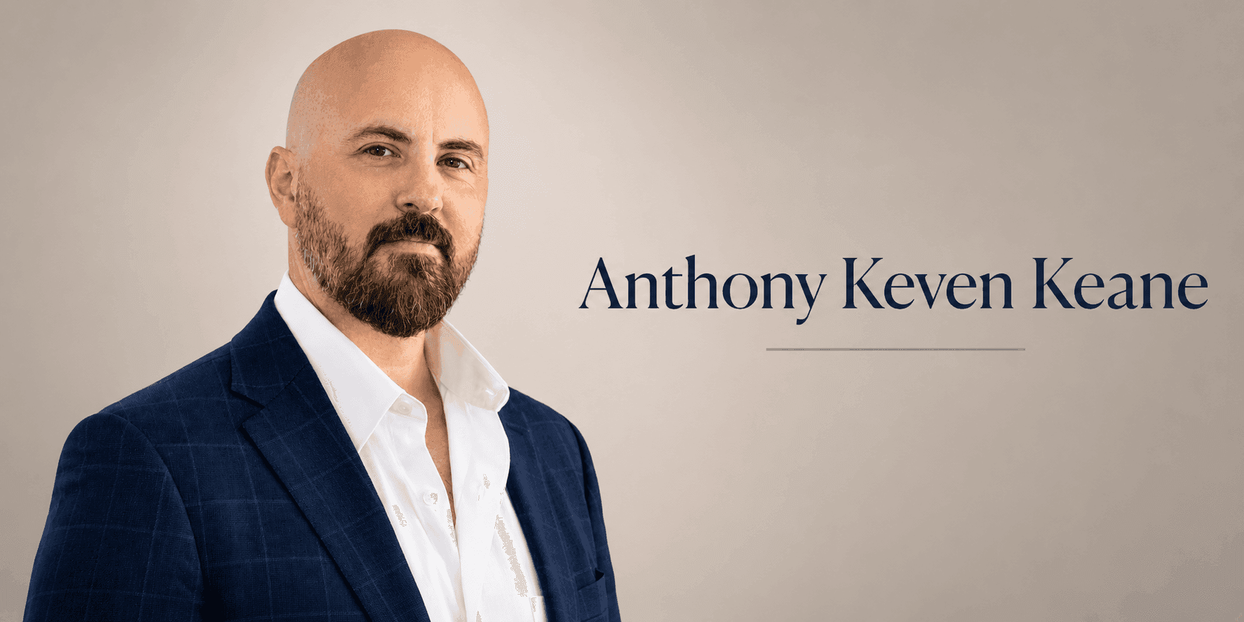 Portrait of author Anthony Keven Keane in a blue blazer, promoting his book Forgiveness for Change.