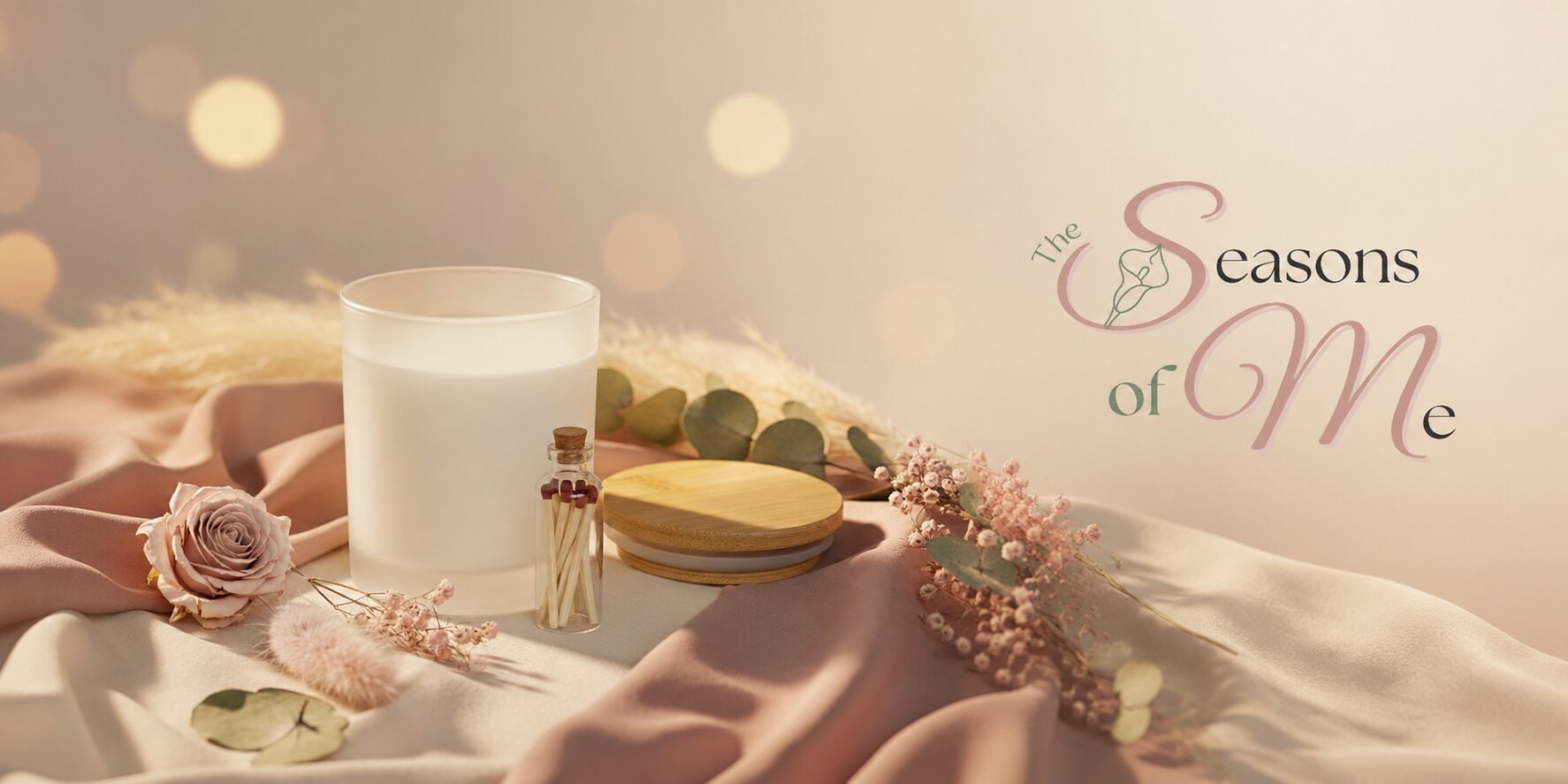 Minimalist candle display with soft florals and branding for The Seasons of Me emotional wellness lifestyle brand.