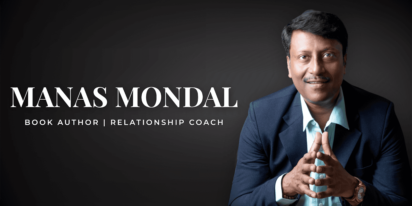 Manas Mondal, book author and relationship coach, posing confidently with a black background, showcasing his professional image.