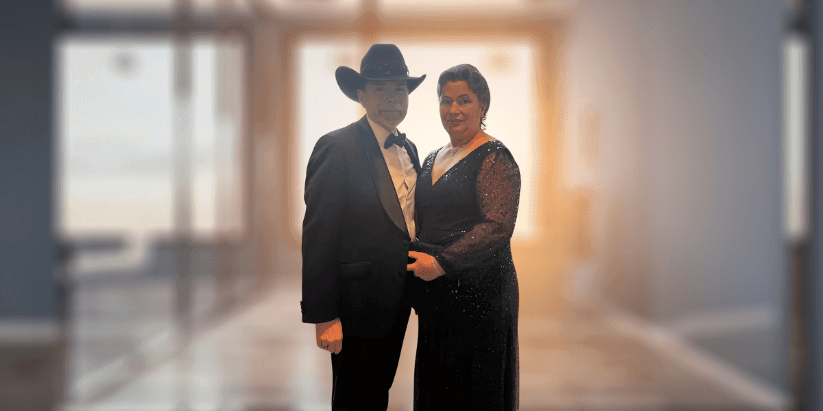 Dean Owen and partner in formal attire, highlighting recognition of his innovative CPA and wealth advisory firm in Paducah.