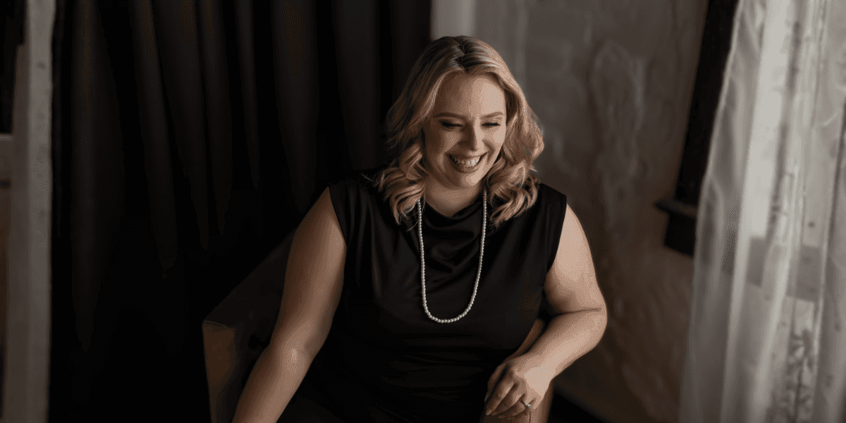 Destiny Pickens smiling confidently, embodying the power of authentic personal branding for women entrepreneurs.