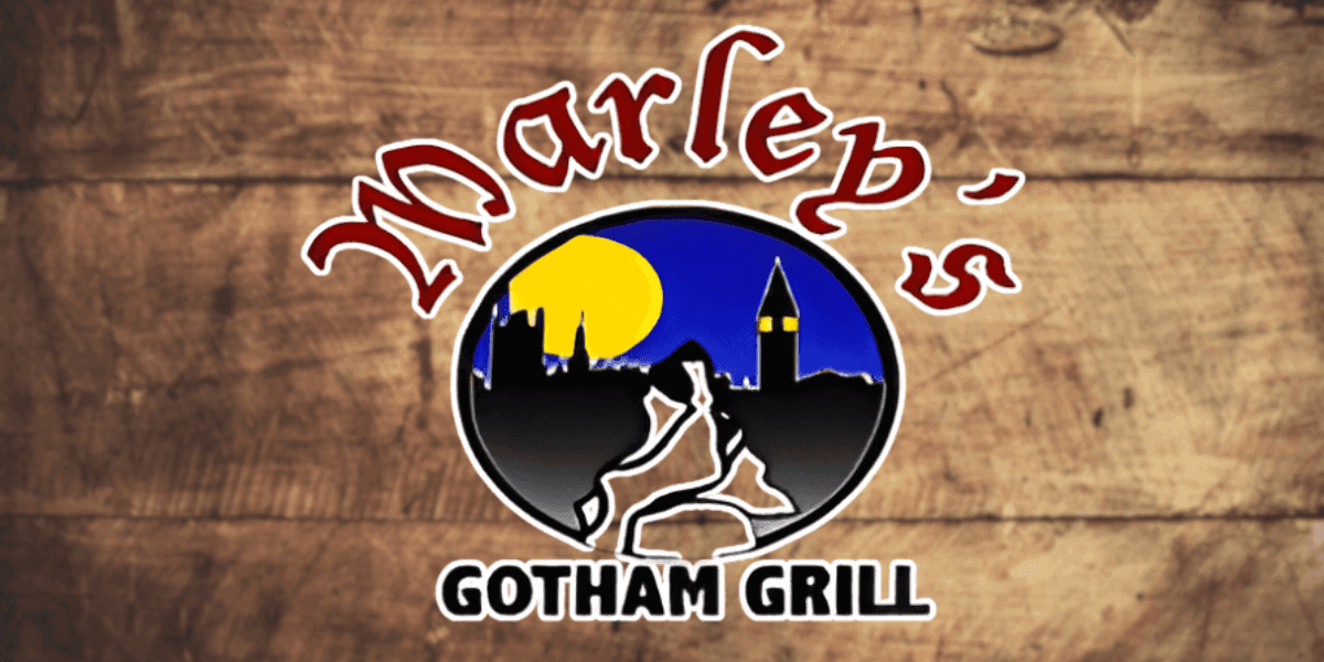 Marley’s Gotham Grill logo with city skyline, full moon, and wooden background representing the King of Wings restaurant.