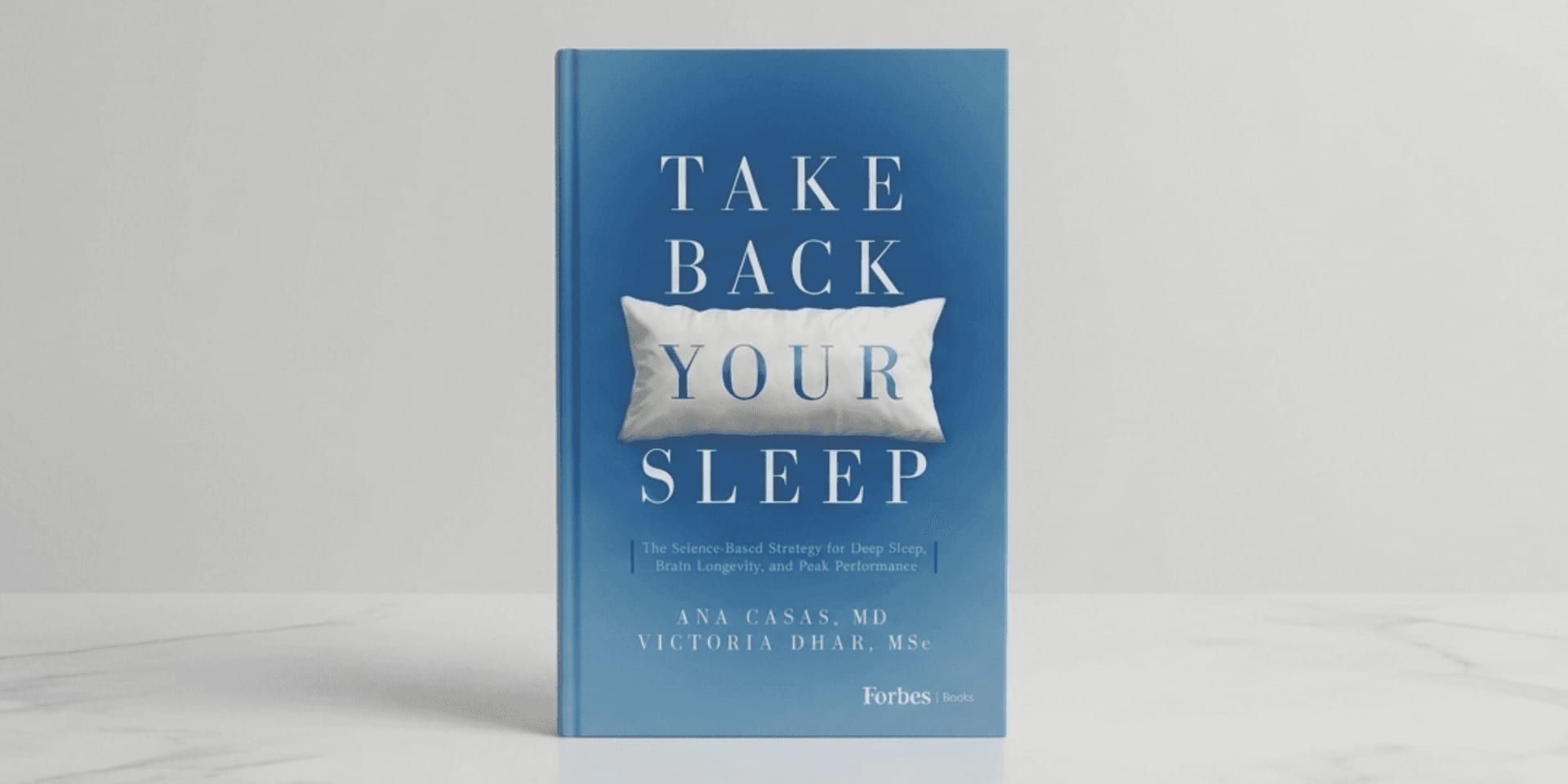 Book cover of “Take Back Your Sleep” featuring a pillow, promoting deep sleep, brain longevity, and recovery strategies.