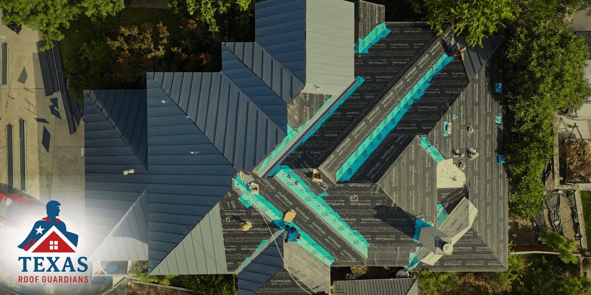 Aerial view of a roof replacement in progress with Texas Roof Guardians branding.