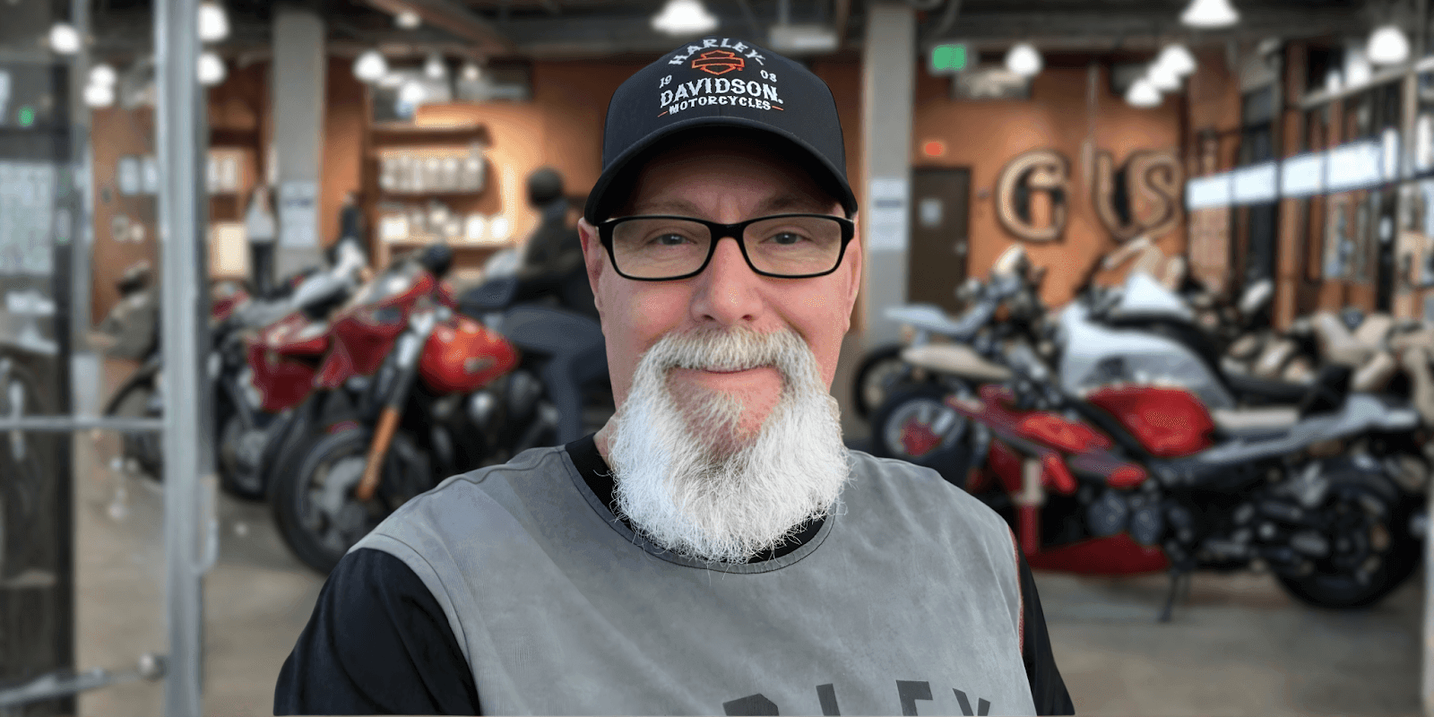 Harley Steve, a renowned Harley-Davidson sales expert, providing personalized motorcycle advice in a well-known dealership environment.