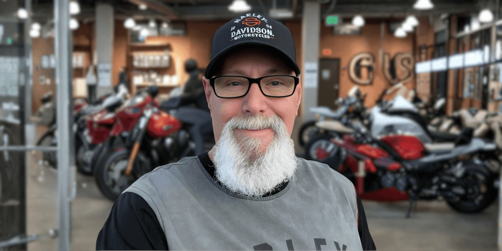 Harley Steve, a renowned Harley-Davidson sales expert, providing personalized motorcycle advice in a well-known dealership environment.