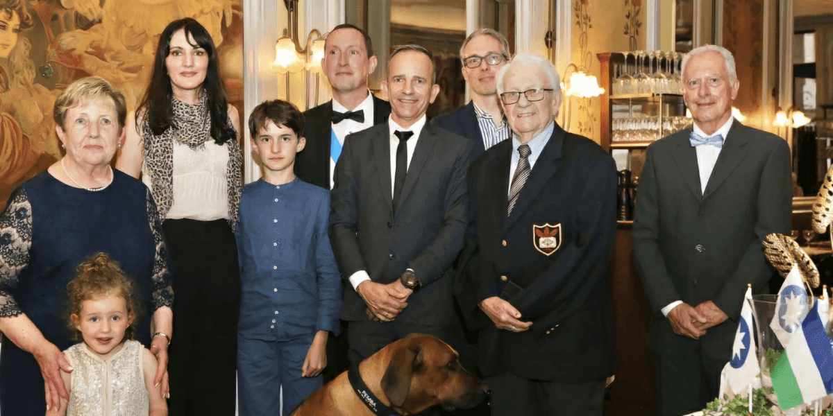 Laurent Lafayne (Prince Antoine V) with family and colleagues at a formal cultural gathering honoring Araucanian heritage.