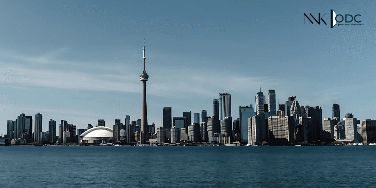 Toronto skyline featuring CN Tower, symbolizing Open Door Collective™'s mission to make real estate accessible and strategic for all