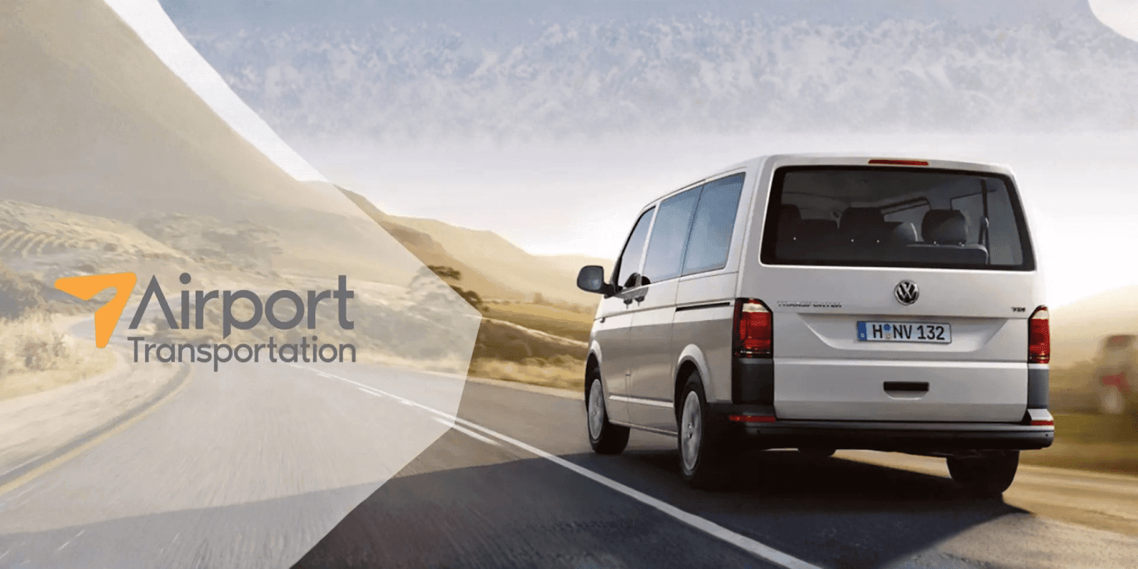 A Volkswagen van drives on a scenic road, symbolizing Airport Transportation's reliable, efficient, and professional airport transfer services.