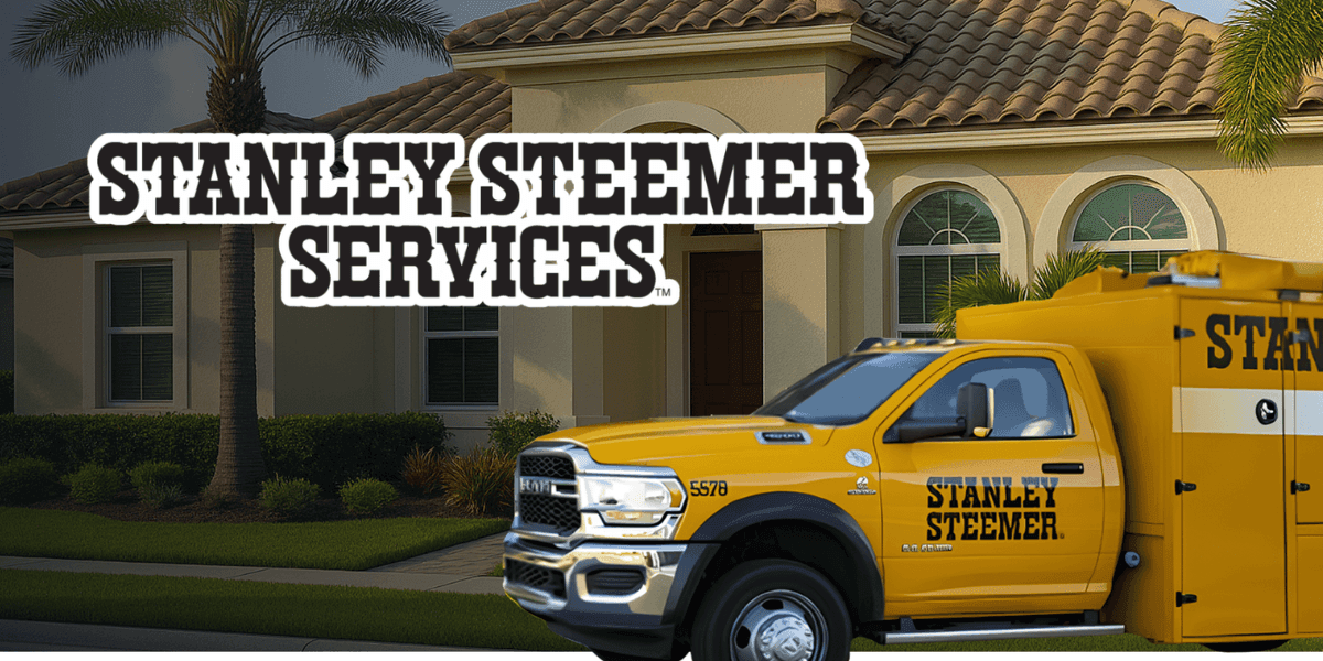 Stanley Steemer service truck parked outside a South Florida home promoting professional home cleaning services.