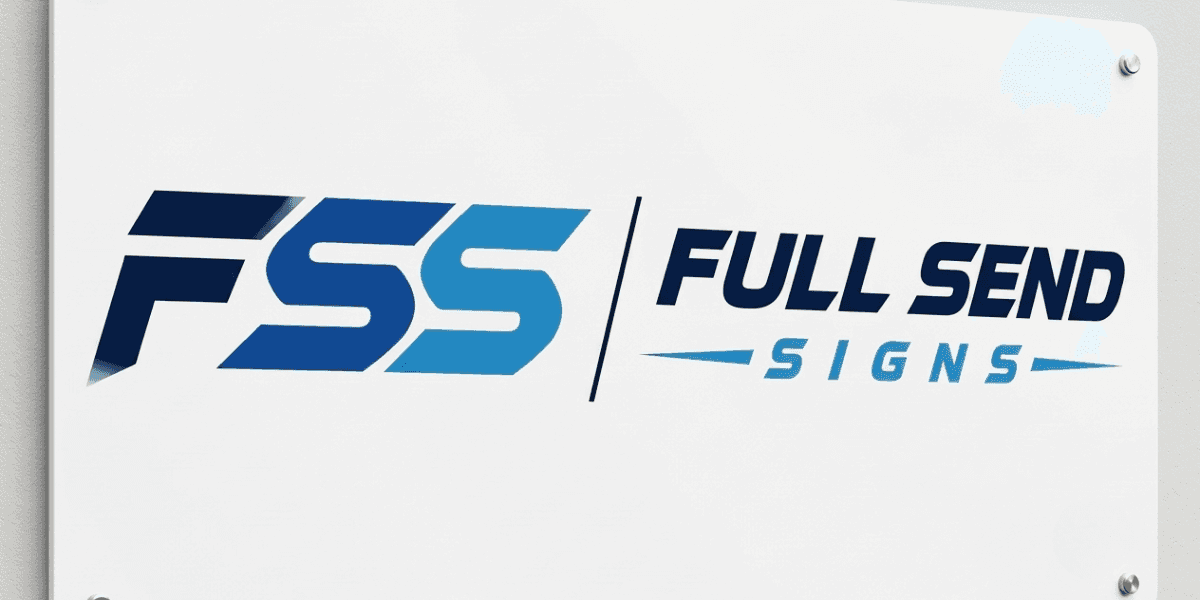 Full Send Signs logo displayed on a white office wall sign.