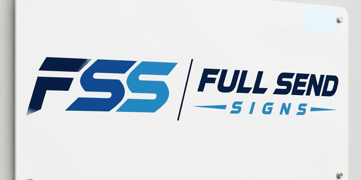 Full Send Signs logo displayed on a white office wall sign.