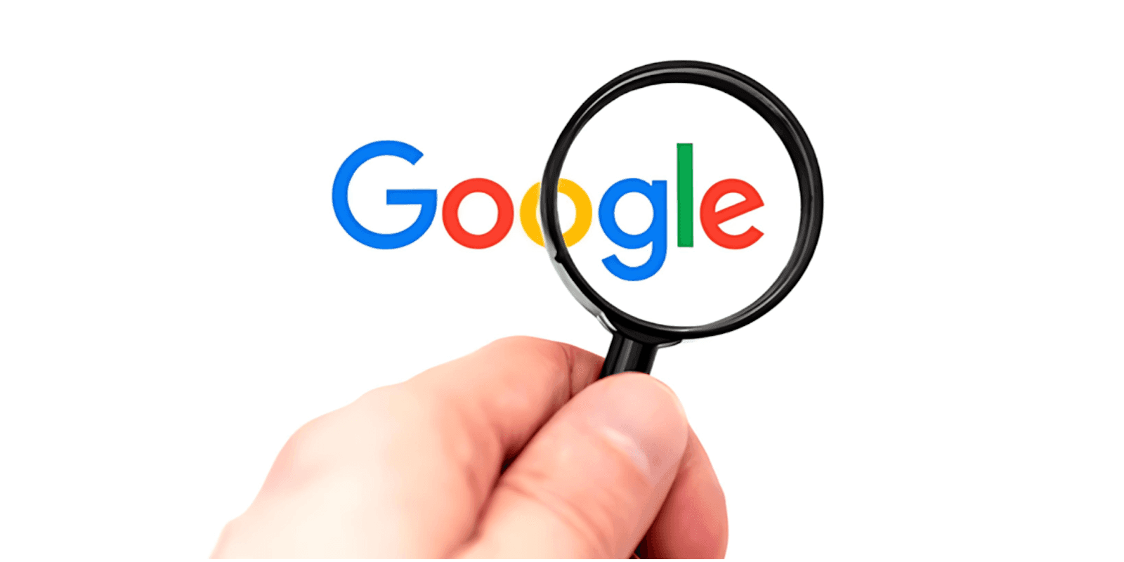 Hand holding magnifying glass over Google logo, symbolizing SEO and search visibility.