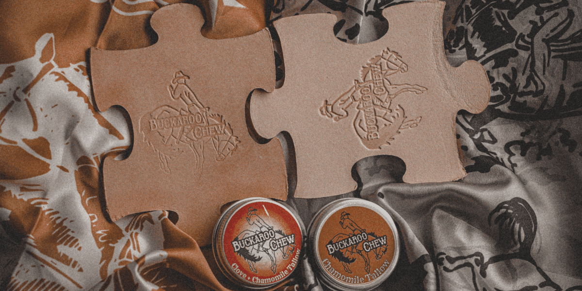 "Buckaroo Chew teething toy, featuring natural vegetable-tanned leather and chamomile-infused beef tallow, offering toxin-free relief for babies."