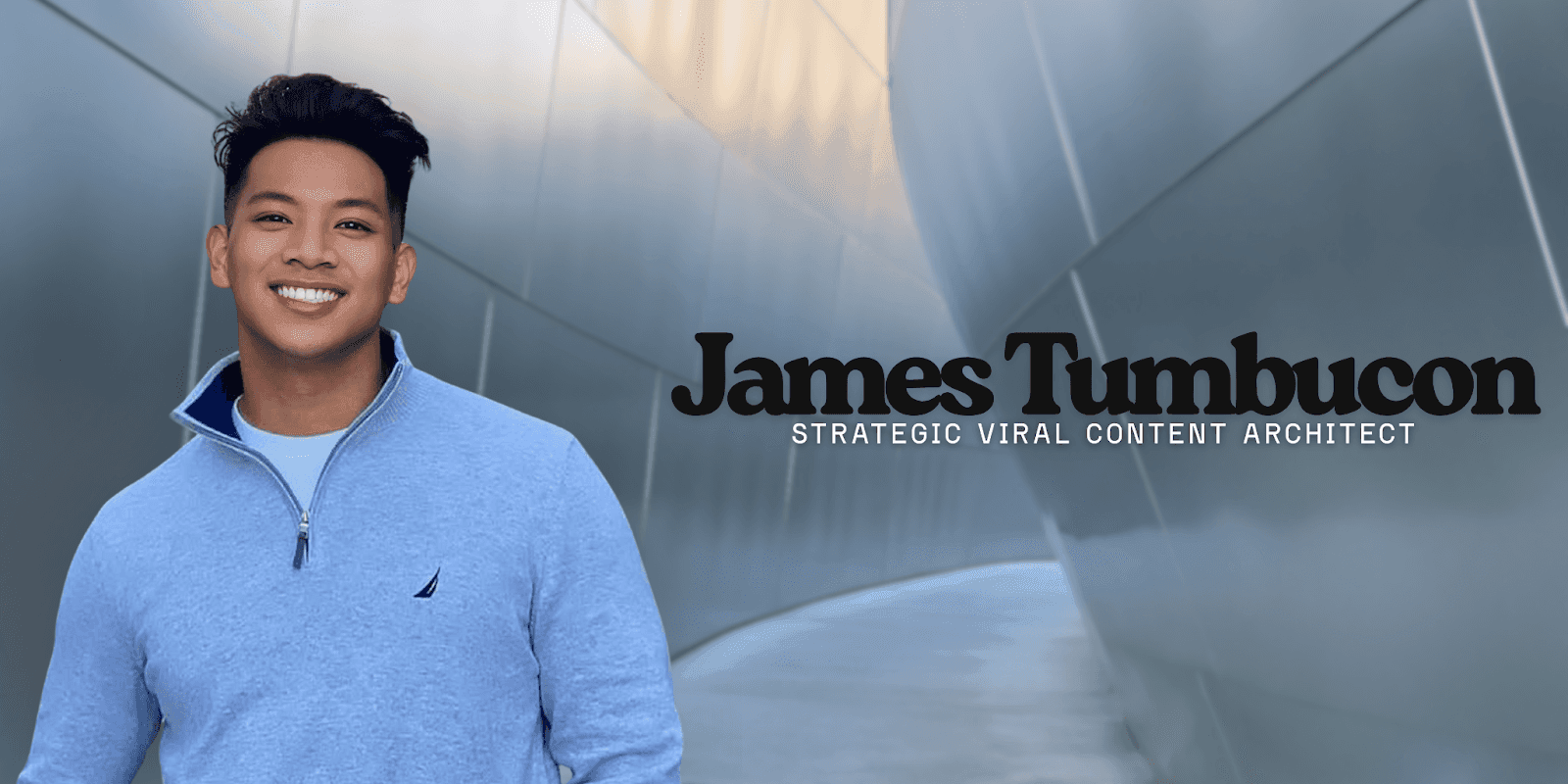 James Tumbucan, Strategic Viral Content Architect, smiling in a blue sweater in front of a modern architectural background."