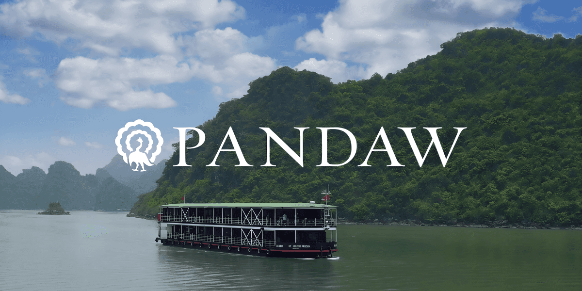 "Pandaw river cruise ship navigating Southeast Asia's scenic waters, offering luxury, cultural immersion, and authentic travel experiences."