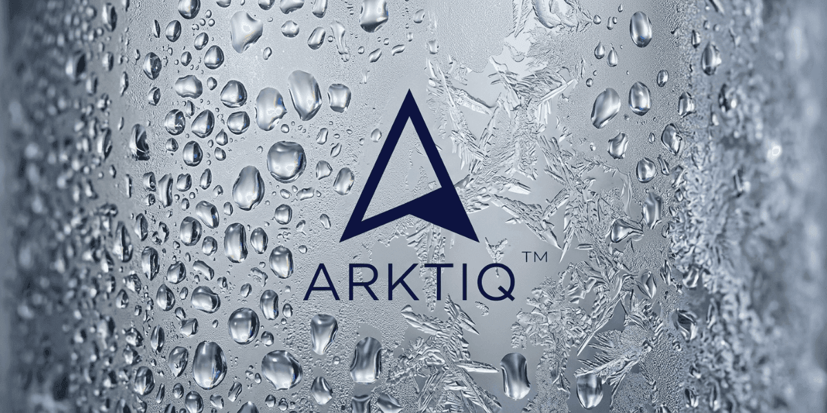 Frosted Arktiq Vodka bottle surface with water droplets and ice crystal textures.