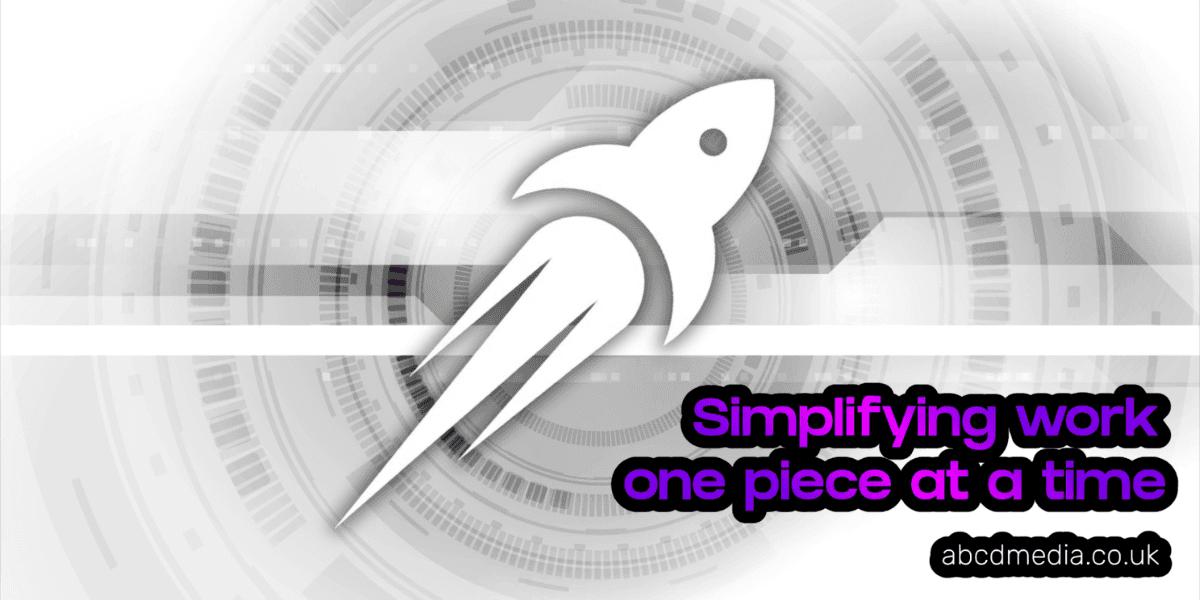 "Rocket symbol in a digital setting with the text 'Simplifying work one piece at a time,' representing efficient business solutions by abcdmedia.co.uk."