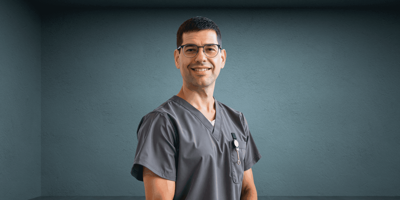 Rick Sørensen Scott, founder of Rick Scott Consulting, wearing professional medical attire, dedicated to evidence-based integrative healthcare.