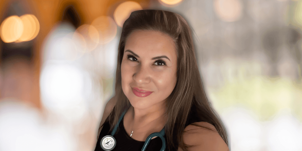 Celeste Albanez, founder of Balanced Health For Women, smiles confidently while wearing a stethoscope around her neck. As a nurse practitioner, she is dedicated to offering personalized telemedicine services that support women’s health, including weight loss and menopause management. Her approach combines affordable, customized care with a holistic focus on wellness, making it accessible to women nationwide.
