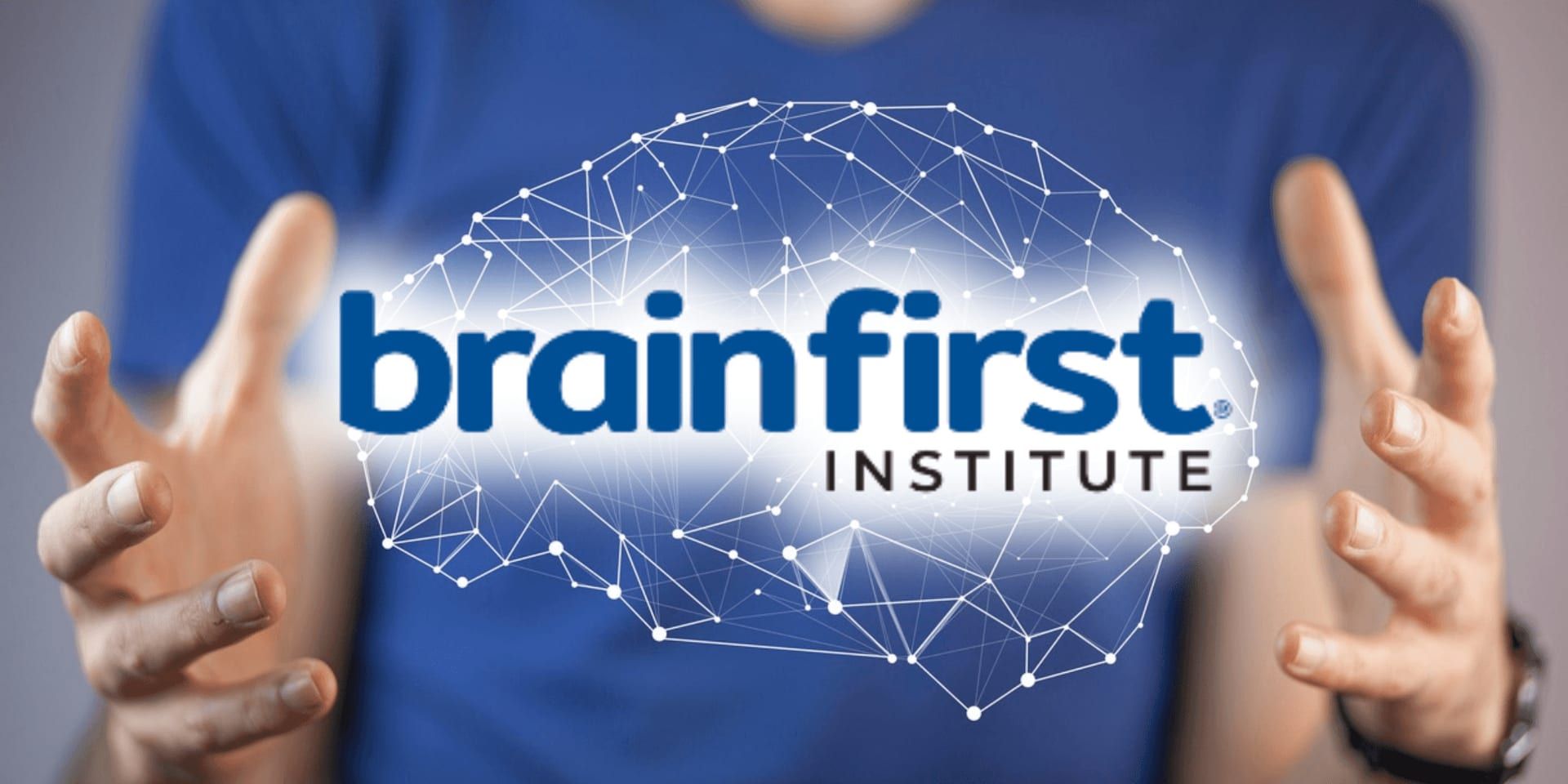 BrainFirst Institute logo displayed within a digital brain graphic between two outstretched hands.