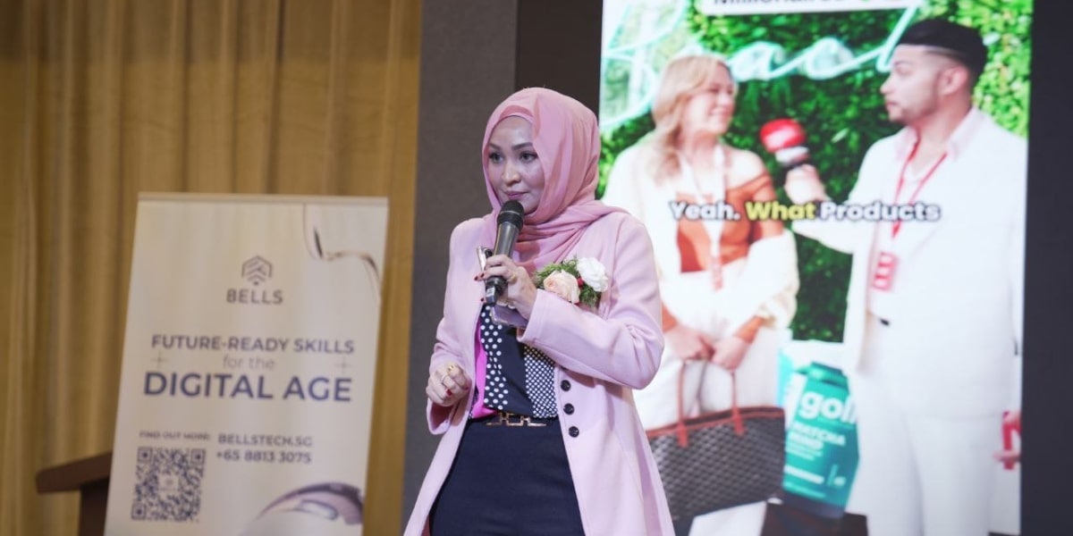 Suria Sparks speaking at an event, empowering women with her Beauty CEO movement for beauty, wellness, and financial independence.